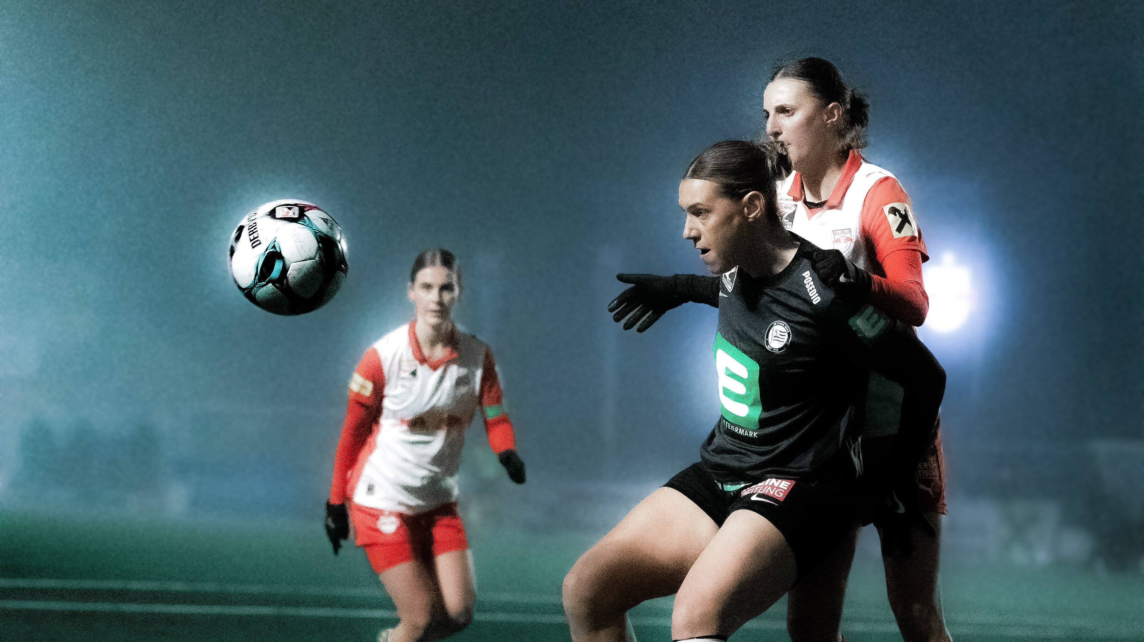 Eine Spielerin in schwarz und eine in rot-weiß kämpfen um einen weißen Ball