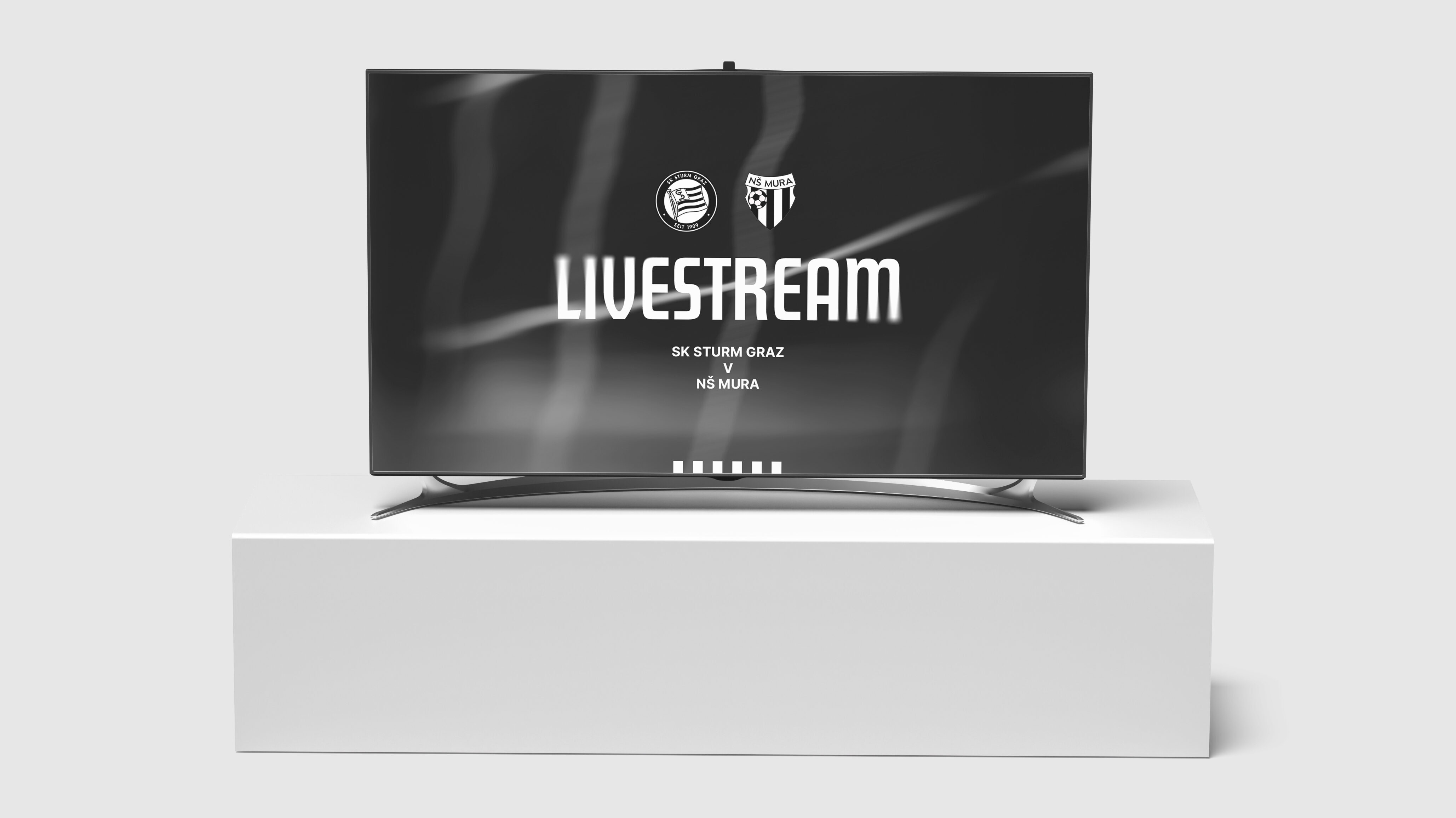 Ein Fernseher zeigt die Live-Übertragung