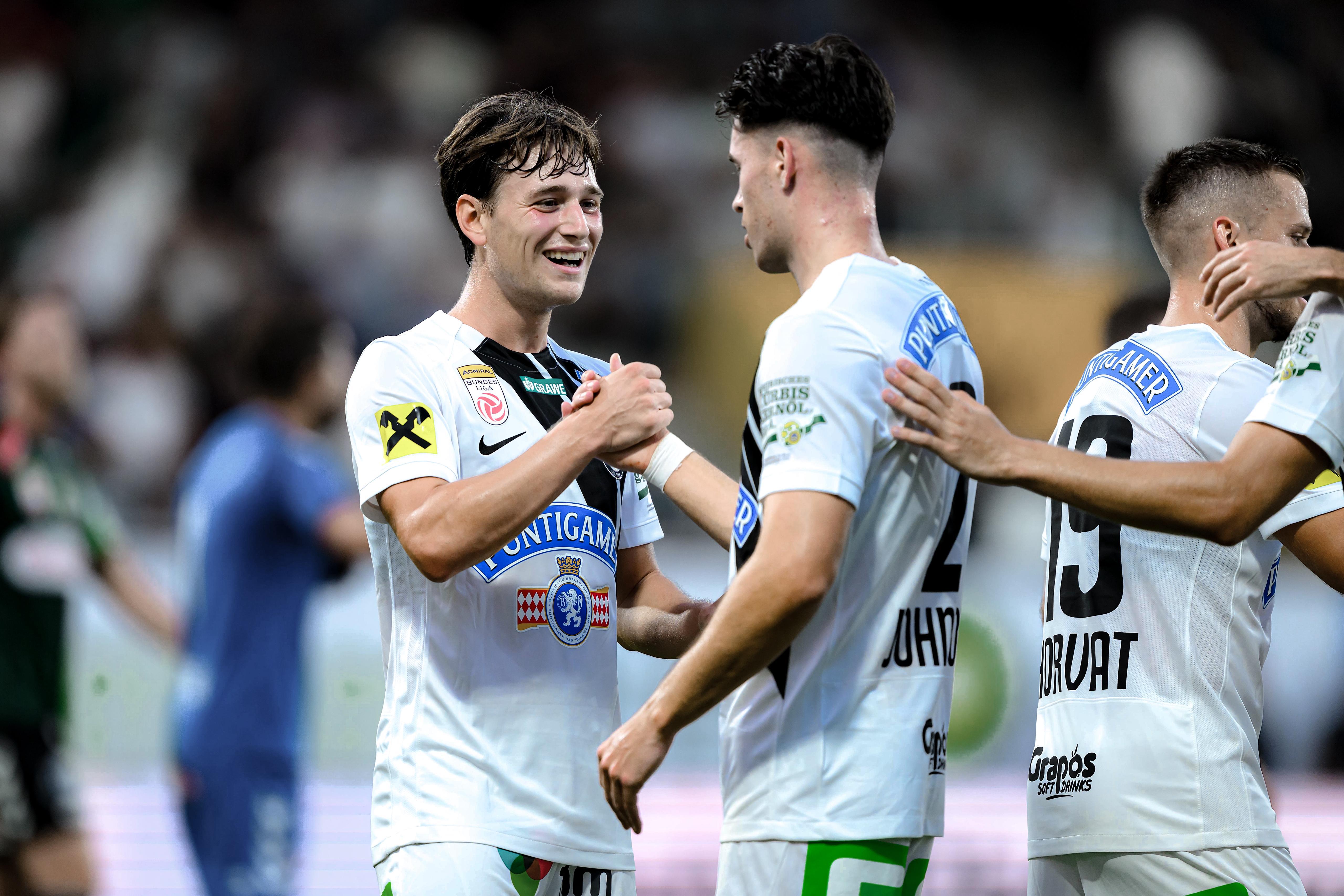 Spieler, die jubeln