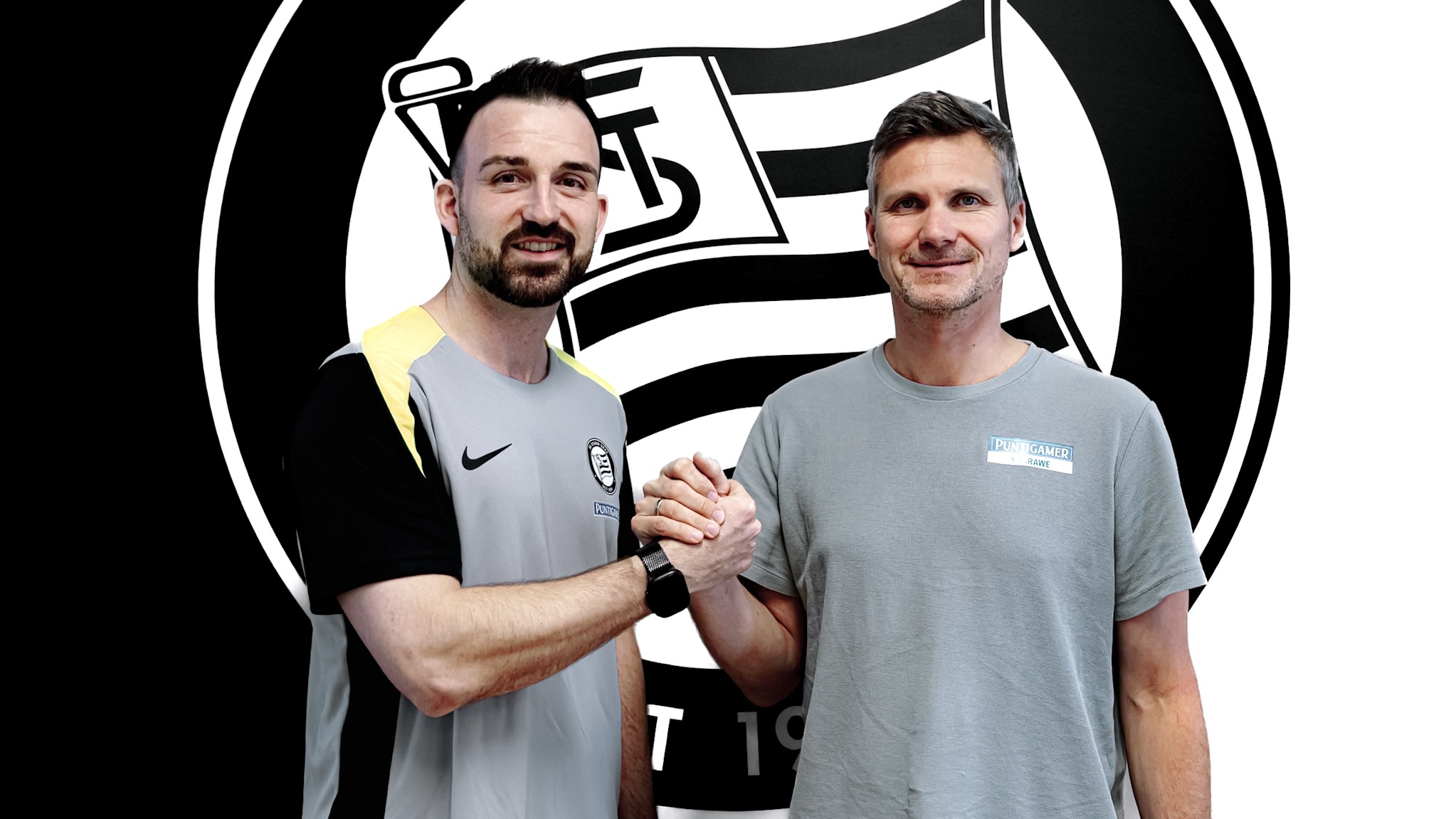 Zwei Personen mit einem Handshake